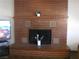 Living room features a brick fireplace and classic parquet floors at 4950 Burnham Ave, Las Vegas, NV 89119