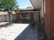 Cozy patio area with stone pavers, perfect for outdoor seating and enjoying the property's exterior at 4950 Burnham Ave, Las Vegas, NV 89119