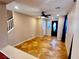 Bright entryway with tile flooring and stairs leading to the upper level for a welcoming feel at 5361 Candlespice Way, Las Vegas, NV 89135