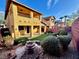 Exterior view showing second-story balcony overlooking backyard at 5361 Candlespice Way, Las Vegas, NV 89135