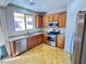 Well-equipped kitchen with stainless steel appliances, granite countertops, and ample cabinet space at 5361 Candlespice Way, Las Vegas, NV 89135