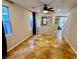 Open living area with unique tile flooring and bright windows, creating a warm and inviting space at 5361 Candlespice Way, Las Vegas, NV 89135