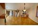 Spacious open-concept living area with tile flooring and a staircase at 5361 Candlespice Way, Las Vegas, NV 89135