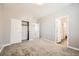 Open room with neutral carpet, white trim and doors, and closet at 5606 Verde Valley Ct, North Las Vegas, NV 89081