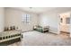 Bright, spacious bedroom with twin beds and ample natural light at 5606 Verde Valley Ct, North Las Vegas, NV 89081