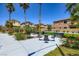 Beautiful community area with picnic tables, seating, palm trees and landscaping at 5606 Verde Valley Ct, North Las Vegas, NV 89081
