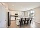 Modern kitchen with an island, stainless appliances, and slider doors for outdoor entertaining at 5606 Verde Valley Ct, North Las Vegas, NV 89081
