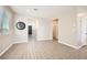 Open-concept living area with wood-look floors, neutral paint, and abundant natural light at 5606 Verde Valley Ct, North Las Vegas, NV 89081