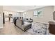 Comfortable living room featuring an open floor plan, seamlessly connected to the kitchen at 5606 Verde Valley Ct, North Las Vegas, NV 89081