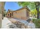 This single-story home shows great desert landscaping, an extended walkway, and a well-kept exterior at 5916 Sorto Lago St, North Las Vegas, NV 89081