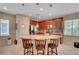Charming kitchen with granite counters, stainless steel appliances, and pendant lighting over the island at 5916 Sorto Lago St, North Las Vegas, NV 89081