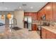 Well-equipped kitchen with stainless steel appliances, and granite countertops at 5916 Sorto Lago St, North Las Vegas, NV 89081