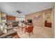 Spacious living room features a fireplace, large windows, and an open floor plan perfect for entertaining and relaxing at 5916 Sorto Lago St, North Las Vegas, NV 89081
