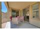 Outdoor patio with small table and four chairs; great for entertaining at 5916 Sorto Lago St, North Las Vegas, NV 89081