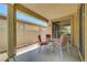 Covered patio featuring outdoor seating and access to the interior of the home at 5916 Sorto Lago St, North Las Vegas, NV 89081