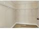 Walk-in closet with shelving for organized storage of clothing and accessories at 6035 Shadow Oak Dr, North Las Vegas, NV 89031