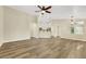 Open living space with modern flooring, kitchen, and an inviting layout at 6035 Shadow Oak Dr, North Las Vegas, NV 89031
