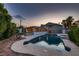 Wonderful backyard pool and hot tub with patio and barbeque for entertaining guests at 6213 Fairwood Ave, Las Vegas, NV 89107