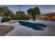 Inviting backyard pool and spa area with a built-in barbecue for outdoor entertaining at 6213 Fairwood Ave, Las Vegas, NV 89107