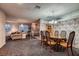 Inviting dining room with ample seating, adjacent to the living room for easy entertaining at 6213 Fairwood Ave, Las Vegas, NV 89107
