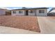 Charming single-story home featuring a low-maintenance desert landscape, solar panels and a freshly painted exterior at 6444 Bannock Way, Las Vegas, NV 89107