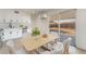 Bright eat in kitchen with stainless steel appliances and slider to backyard at 6444 Bannock Way, Las Vegas, NV 89107