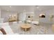 Spacious living room with stylish furnishings open to dining area at 6444 Bannock Way, Las Vegas, NV 89107
