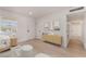 Bright living room featuring modern decor and light wood flooring at 6444 Bannock Way, Las Vegas, NV 89107