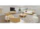 Bright living room with sleek modern furniture and a neutral color palette, virtually staged at 6444 Bannock Way, Las Vegas, NV 89107