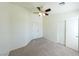 Comfortable bedroom with carpet flooring and ceiling fan at 6459 Rusticated Stone Ave # 103, Henderson, NV 89011
