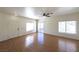 Spacious living room features wood floors, natural light, and access to backyard at 6459 Rusticated Stone Ave # 103, Henderson, NV 89011
