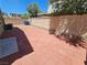 Backyard featuring stone pavers and perimeter fencing at 6824 Briarwood Bend Ave, Las Vegas, NV 89130