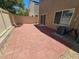 Backyard featuring stone pavers and perimeter fencing at 6824 Briarwood Bend Ave, Las Vegas, NV 89130