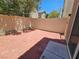 Backyard featuring stone pavers and perimeter fencing at 6824 Briarwood Bend Ave, Las Vegas, NV 89130