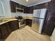 Well-equipped kitchen features stainless steel appliances and sleek cabinets at 6824 Briarwood Bend Ave, Las Vegas, NV 89130