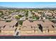A high angle view of the home in the neighborhood with multiple units and attached garages at 6868 Sky Pointe Dr # 2035, Las Vegas, NV 89131