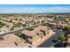 A neighborhood featuring residential homes with attached garages, set against a backdrop of mountains at 6868 Sky Pointe Dr # 2035, Las Vegas, NV 89131