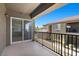 Private balcony overlooking the building's exterior, offering a serene outdoor space with sunlight at 6868 Sky Pointe Dr # 2035, Las Vegas, NV 89131