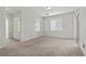A serene bedroom with neutral colors and natural light from the windows at 6868 Sky Pointe Dr # 2035, Las Vegas, NV 89131