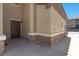 Welcoming exterior entrance features stone accents, covered entry, and easy access to the home at 6868 Sky Pointe Dr # 2035, Las Vegas, NV 89131