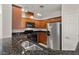 Granite counters, and stainless steel appliances are the highlight of this well-appointed kitchen at 6868 Sky Pointe Dr # 2035, Las Vegas, NV 89131