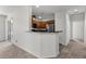 Open living and kitchen area has neutral colors and modern recessed lighting at 6868 Sky Pointe Dr # 2035, Las Vegas, NV 89131