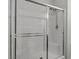A bright bathroom with a new sliding glass door shower at 6868 Sky Pointe Dr # 2035, Las Vegas, NV 89131