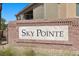 Sky Pointe neighborhood entrance sign set in stone with landscape at 6868 Sky Pointe Dr # 2035, Las Vegas, NV 89131