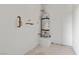 An efficient water heater installed with visible pipes and fittings in an unfinished room at 6868 Sky Pointe Dr # 2035, Las Vegas, NV 89131