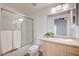 Bright bathroom featuring a shower/tub combo with glass door and neutral vanity at 6955 N Durango Dr # 1093, Las Vegas, NV 89149