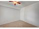 Clean bedroom featuring neutral carpet, white walls, and natural light at 6955 N Durango Dr # 1093, Las Vegas, NV 89149