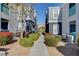 Well-manicured landscaping and exterior walkways offer a peaceful ambiance between apartment homes at 6955 N Durango Dr # 1093, Las Vegas, NV 89149