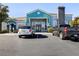 The clubhouse featuring elegant architectural details, complemented by convenient parking for visitors at 6955 N Durango Dr # 1093, Las Vegas, NV 89149