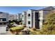 Modern apartment complex featuring landscaped grounds and colorful architectural details at 6955 N Durango Dr # 1093, Las Vegas, NV 89149